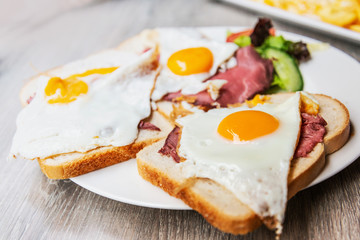 Egg and fries - classical english breakfast with egg and fries