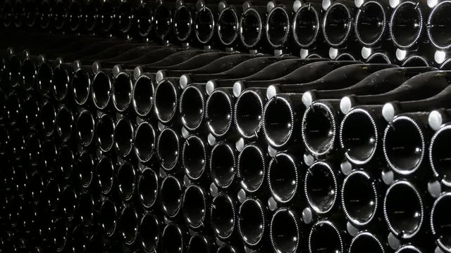 Production of Sparkling Wine of Champagne . Old Wine Cellars a Warehouse with Bottles