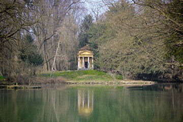 little temple with reflection in the lake of the Park of Monza . lombardy