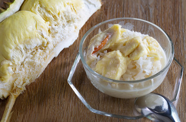 Durian with coconut milk and sticky rice in glass bowl, Popular thai dessert