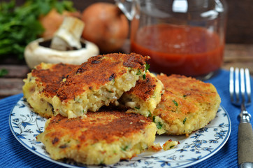 Vegetarian cutlets on a plate on a wooden background