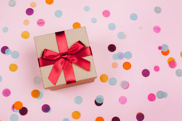Present box with red bow
