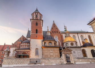 Cathedral of St. Stanislaw and St. Vaclav and royal castle on the Wawel Hill at sunset, Krakow, Poland.