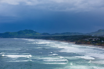 A late Spring storm stirs up the waves off Moolack beach, Newport, Oregon