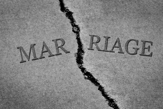 Symbol Of Broken Marriage With Crack In Concrete And Word