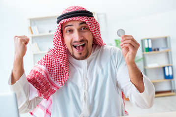 Arab man with bitcoin in cryptocurrency mining concept