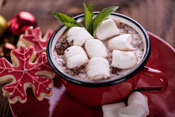 Fototapeta na wymiar hot chocolate with marshmallow merry christmas background