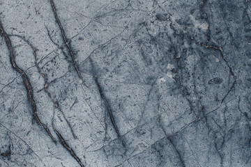 Fragment of stone texture with scratches and cracks. Natural Background.