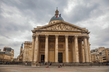 Obraz premium Facade of the Pantheon in Neoclassical style, with dome and columns at the entrance in Paris. Known as the “City of Light”, is one of the most impressive world’s cultural center. Northern France.