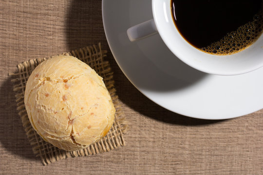 Pao De Queijo Is A Cheese Bread Ball From Brazil. Also Known As Chipa, Pandebono And Pan De Yuca. Snack And Cup Of Coffee On Wood, Overhead.