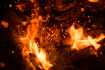 fire flames with sparks on a black background