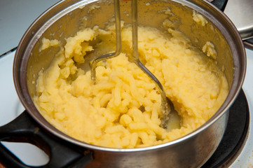 puree from potatoes, in a saucepan boiled potatoes, mash
