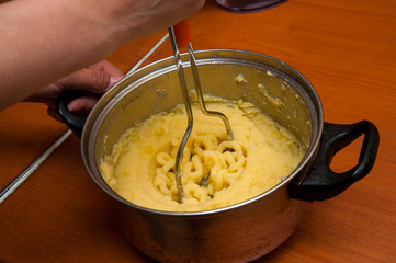 puree from potatoes, in a saucepan boiled potatoes, mash