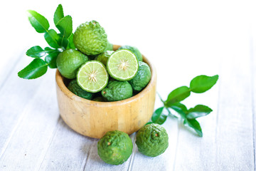 Bergamot green leaves isolated on white background
