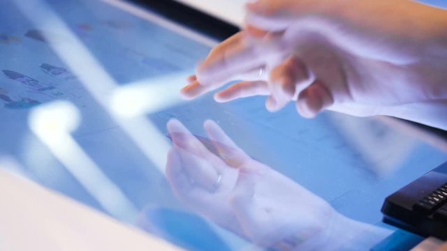 Networking graphical concept. Briefing in workplace. Businesswoman shows colleagues investment financial infographic close up on device at corporate training. Economy achievement, finance improvement