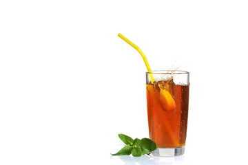 Splashes of iced tea from lemon slice on white isolated background.
