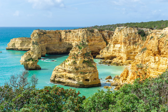 View of beautiful Marinha beach with crystal clear turquoise water near Carvoeiro town, Algarve region, Portugal