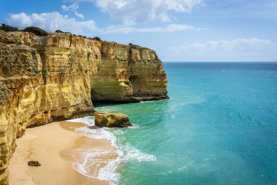 View of beautiful Marinha beach with crystal clear turquoise water near Carvoeiro town, Algarve region, Portugal