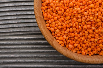 raw lentils on a wooden rustic background