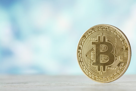 Bitcoin and light bokeh with copy space