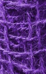 Abstract view of a coconut rope toning in ultra violet. Unusual texture background.
