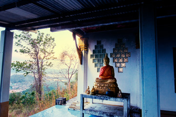 Golden statues of buddha in thai temple.