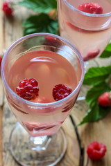 White wine with fresh raspberries. raspberry cocktail