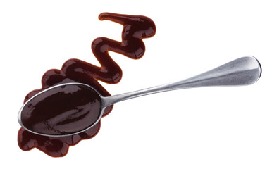 Barbecue sauce with spoon isolated on white background. Top view