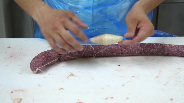 Meat industry, artisanal production of Italian sausages, slow motion