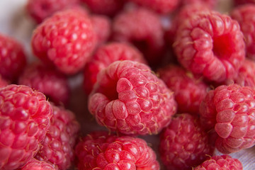 Vitamins. Summer berries. Raspberries background. Close up, top view, high resolution product. Harvest Concept