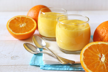Orange curd and juicy oranges