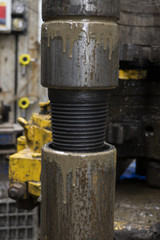 Drilling pipe. turned the drill pipe with a drilling wrench. Drilling of oil and gas wells. Oil industry. Oil drill pipe. Threaded connection