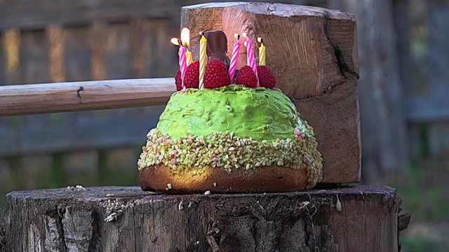 Food preparation crushed by a hammer giant, slow motion