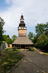 Wooden orthodox Carpathian Ruthenian Church of the Saint Michael Archangel at Kinsky Gardens, Petrin, Czech Republic, typical folk wooden log building with shingled roof