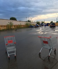 Supermarket baskets in the Parking lot of the shopping center
