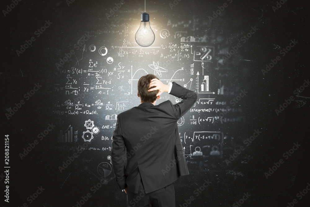 Aufkleber man looking at formulas