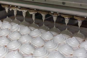 Confectionery factory, food industry production. Tray with marshmallow or zephyr made by automated machinery equipment