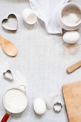 Vertical rustic kitchen background  with ingredients for baking
