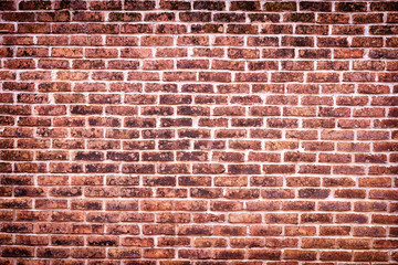 Red brick wall textured background.