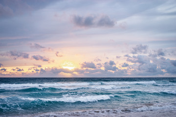 Stormy weather. Beautiful seascape with cloudy sky. Sunset on the beach.