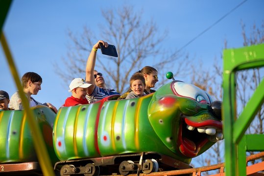 Adults and childrens ride on the Russian roller coaster