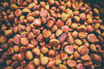 Chestnuts textured pattern background.