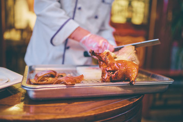 Preparation of Peking Roast Duck. Peking Duck is a famous duck dish from Beijing.