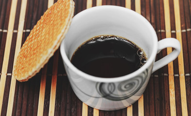 Stroopwafel and black coffee.