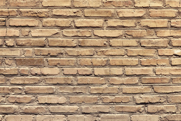 An ancient old rough drystone wall. Background photo. Texture pattern.