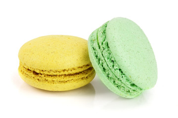 yellow and green macaroon isolated on white background closeup