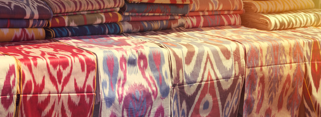 Traditional Uzbek asian silk. Colorful traditional uzbek xonatlas hon atlas textile fabric...