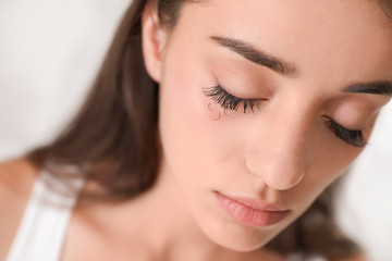 Young woman with eyelash loss problem, closeup