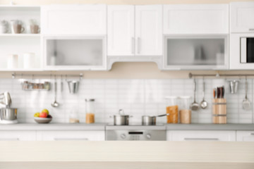 Countertop and blurred view of kitchen interior on background
