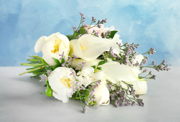 Obraz na płótnie Canvas Bouquet of beautiful fragrant flowers on table
